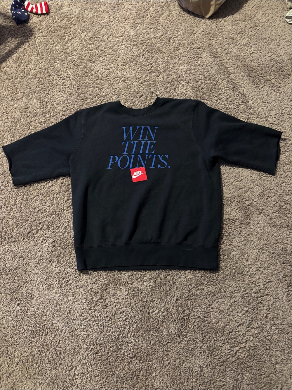 Nike Black Sweatshirt with Blue "WIN THE POINTS." Text and Red Logo